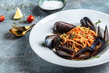 Pasta with seafood mussels and prawns. Restaurant menu, dieting, cookbook recipe