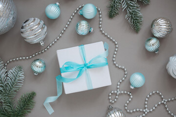 New year and Christmas tree decorations on grey background