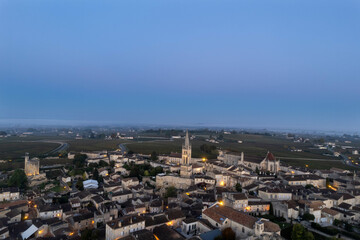 Naklejka premium DRONE PHOTOGRAPHIE - PANORAMA OF SAINT EMILION - SUNSET