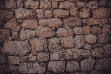 The wall is made of mountain stones. Stone Wall
