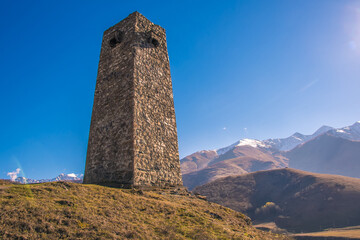 Ancient stone ancestral tower in the mountains