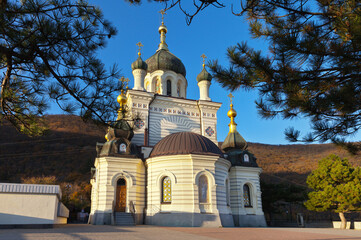 Fototapeta na wymiar Crimea. A beautiful building in the Byzantine style of the Orthodox Church of the Resurrection of Christ, built in 1892 at an altitude of 412 m on the steep Red Rock above the town of Foros