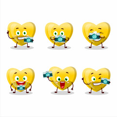 Photographer profession emoticon with yellow love gummy candy cartoon character