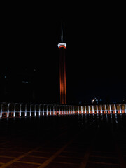 Central Jakarta, Indonesia - May 12th, 2021 : The minaret of the Istiqlal Mosque at night, this tower has a height of 6,666 cm, symbolizing the many verses in the Quran.