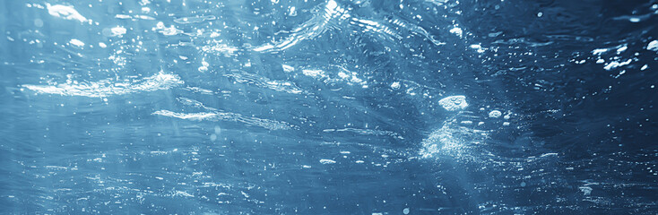 air bubbles underwater blue background, ocean depth diving