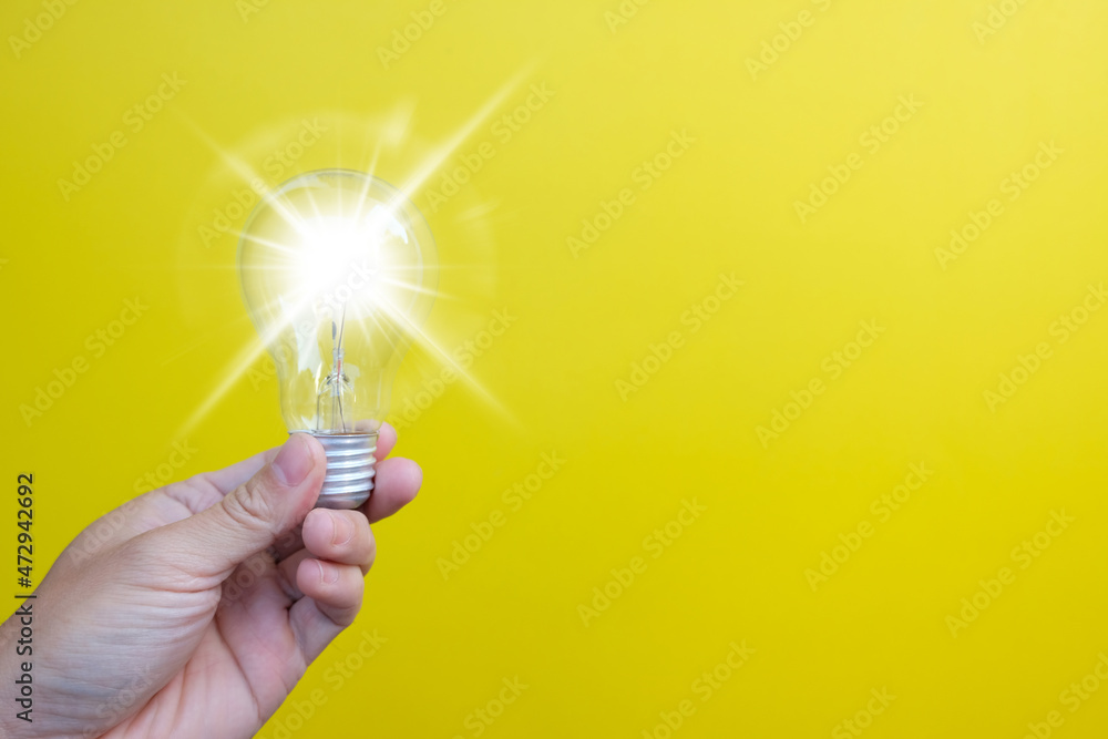 Sticker light bulb on yellow background, notion of idea creativity and inspiration, future technology