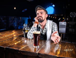 Experienced bartender demonstrates the process of making a cocktail in the bar