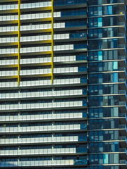 Close-up of contemporary skyscrapers in Melbourne. The city implemented building height restrictions in the early 1900s typically 150 feet or 45 meters. It hampered skyscrapers development until 1950s