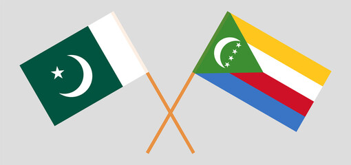 Crossed flags of Pakistan and the Comoros. Official colors. Correct proportion