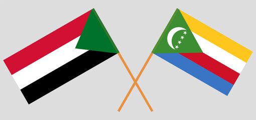 Crossed flags of the Sudan and the Comoros. Official colors. Correct proportion