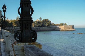 Cadiz Andalusia Spain old town historic fort city wall promenade botanic garden house facades...