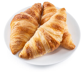 Tasty crusty croissants on the plate on white background. File contains clipping path.