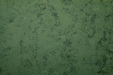 Green background with plaster texture. Horizontal banner