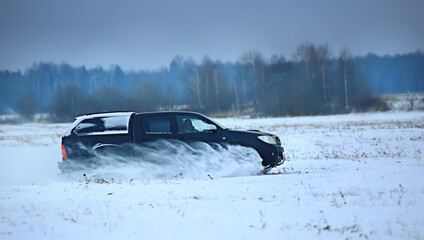 off-road vehicle drift in the snow field adventure winter speed nature