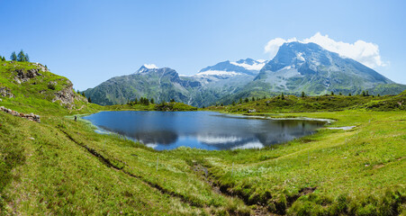 The meadows, glaciers, lakes and mountains of the Simplon Pass: one of the most beautiful areas of Switzerland located in the heart of the Alps - July 2021.