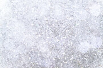 patterns on a light background, winter background, ice texture, frosty pattern, glittery background, glitter, shimmering texture with glittering stars