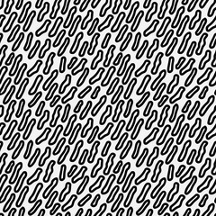 Abstract hand drawn seamless pattern with free form shape elements. Black and white texture.