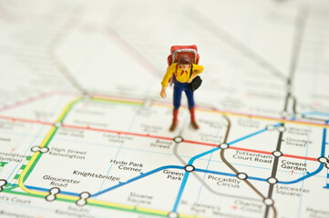 traveler with backpack on a map of London