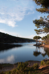 Autumn in the forest and lake. A beautiful view from lake. No people.