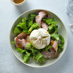 Green salad with mortadella and burrata cheese