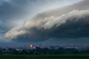 The storm over the city. Huge storm clouds over Lublin in Poland and torrential rain.