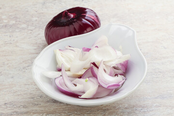 Sliced red onion in the bowl