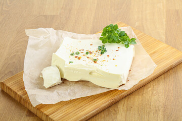Greek Feta cheese over board