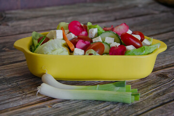 A served fresh and crisp summer salad.