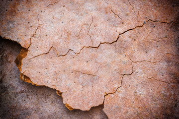 Homemade cracked flatbread with darkening image corners as background