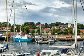 Marina with boat by small old town in Denmark, Svendborg