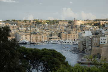 Fototapeta premium Old Medieval walled town by the sea over cliff in Malta, Valetta, Vittoriosa, Senglea and Cospicua, known as the Three Cities