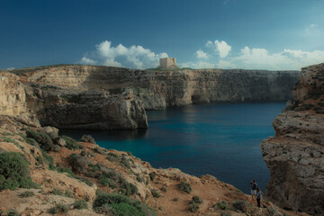 Fototapeta premium Coast with water and sky in late day on island of Malta, Gozo