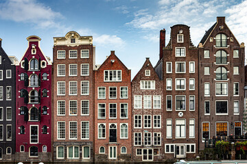 Street view with buildings and during day and canal in Amsterdam, Netherlands