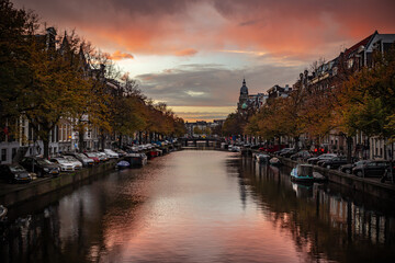 Fototapeta premium Street view with buildings and during day and canal in Amsterdam, Netherlands