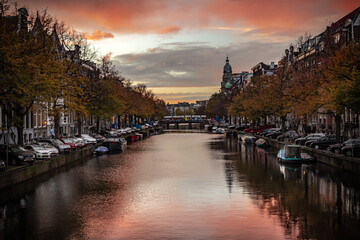 Fototapeta premium Street view with buildings and during day and canal in Amsterdam, Netherlands