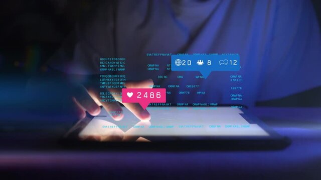 Hand using tablet with social media icons notification - Powered by Adobe