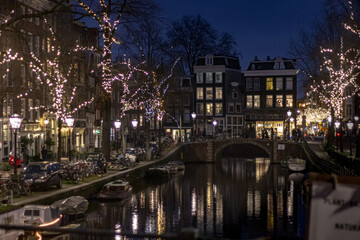 Fototapeta na wymiar Night walk on streets of Amsterdam, Netherlands