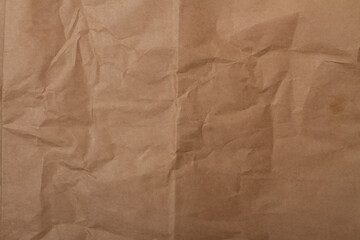 texture of natural crumpled brown paper. background