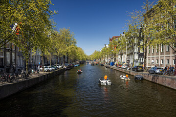 Canals of Amsterdam with good weather in early spring