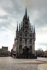 Fototapeta premium Old streets and buildings in Gouda, Netherlands