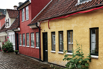 Charming street corner with beautiful building in Odense, Denmark