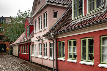 Charming street corner with beautiful building in Odense, Denmark