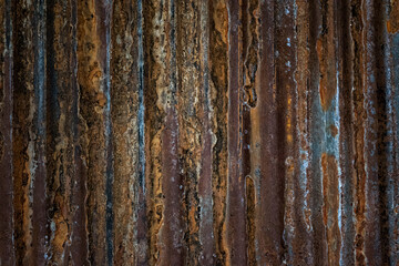 old rusty galvanized, corrugated iron siding vintage texture background