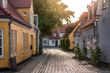 Beautiful houses in old town at sunset in Koege, Denmark
