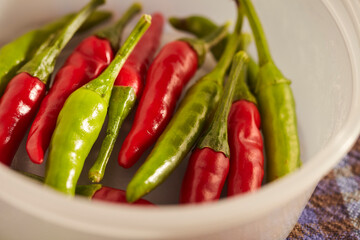 Whole, fresh Thai chili peppers, ready for cooking