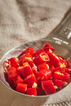 A tablespoon of chopped, fresh, Thai red chili peppers