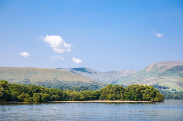Fototapeta na wymiar Loch Lomond lake one of the beautiful lakes of Scotland Highlands. Mountains and beautiful Scottish nature