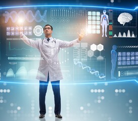 Doctor in futuristic medical concept pressing button
