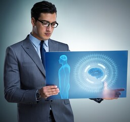 Futuristic remote diagnostics concept with businessman