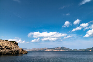 Sailing from boat with coast in horizon during clear day in Spain, Mallorca